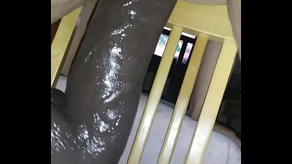 Bbw takes in a big black dildo 