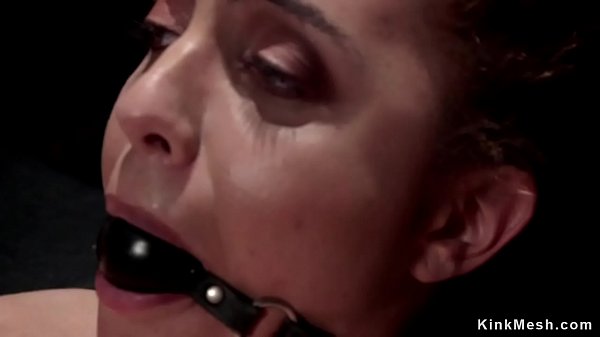 Gagged spinner caned in hogtie