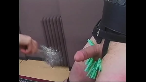 Mature dominatrix Mistress Scarlett pours hot wax on dude'_s balls and cock