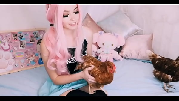 Pink-haired belle delphine girl playing with a chicken: bit.ly/2D3clAG
