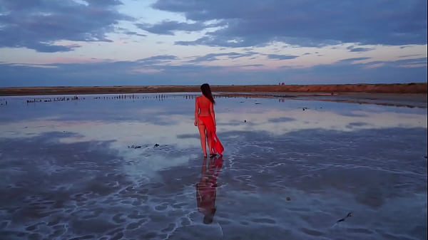 Pink Sunset And Mature Woman thumbnail