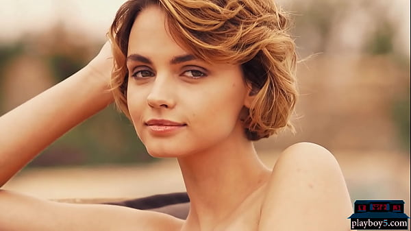 Tiny redhead teen hottie takes off her bikini and shows off 