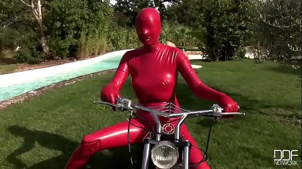 Busty babe toying in full latexwear