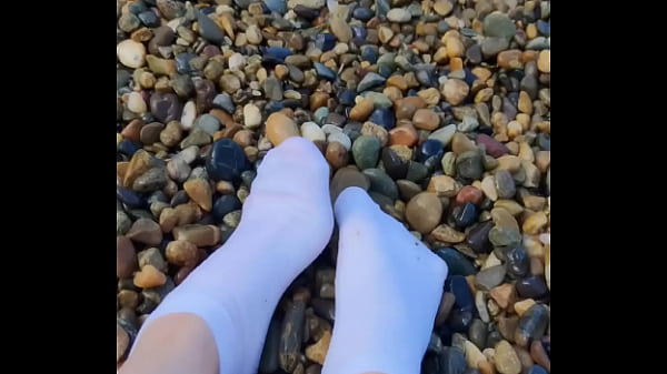 Nonton Playing With My Feet In White Socks With Pebbles On The Beach thumbnail