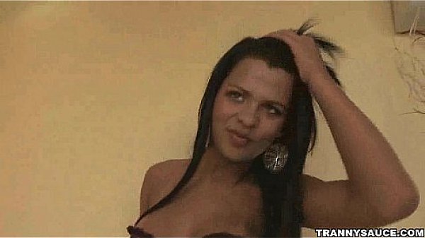Foxy Brunette Tranny Babe Tugging On Her Hard Cock thumbnail