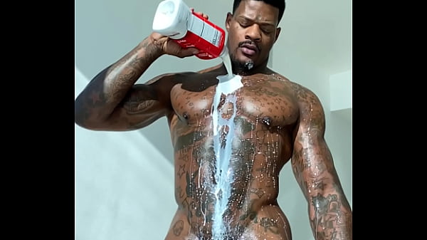 Pornstar Jason Luv bathes in milk