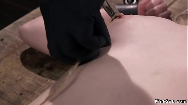 Blonde Slave Violet October With Pale Skin In Metal Device Bondage Gets Whipped thumbnail