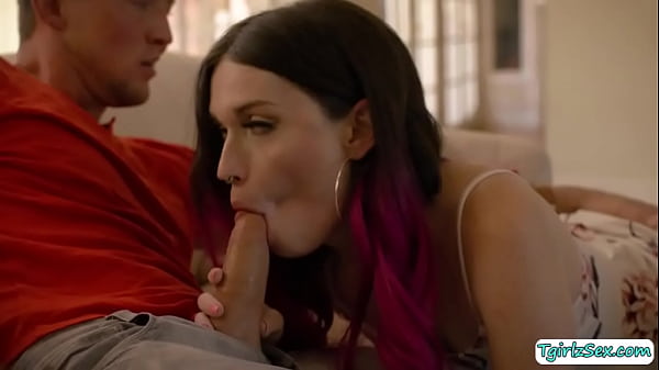 In the couch handsome straight guy Pierce Paris makes out with beautiful blonde transexual Natalie Stone kissing and tit sucking while caressing. 