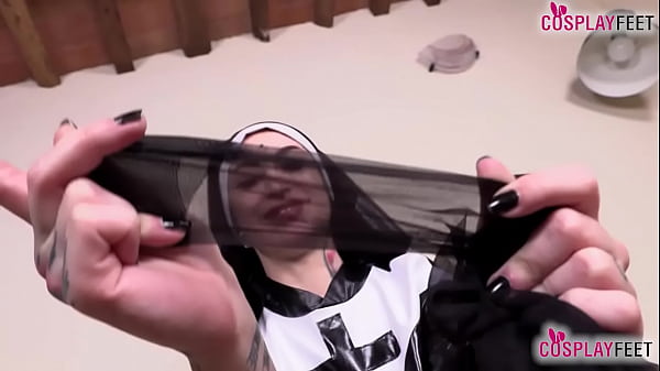 Horny tattoed nun in pantyhose sucks and licks her feet