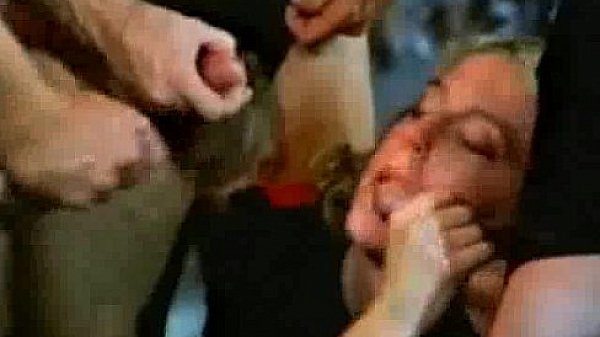 Horny blonde giving three horny men blowjobs 