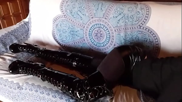 Total Black With Fishnets Pantyhose And Boots Over The Knee thumbnail