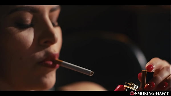 Hot Brunette With Red Lipstick Nails And Sexy Lingerie Touching Herself While Smoking Cigarette thumbnail