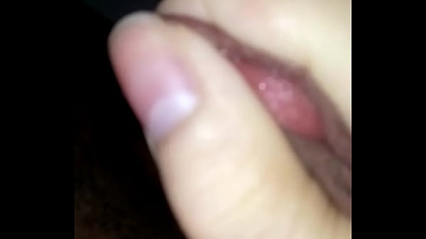 Masturbating