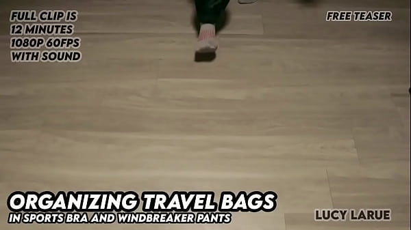 Nonton Organizing Travel Bags In Sports Bra And Windbreaker Pants thumbnail