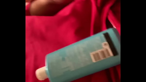 The puppy having fun while making a nice trick with shampoo and his bone 