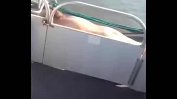 Blonde Milf Sun Bathing Naked On Pontoon Boat thumbnail