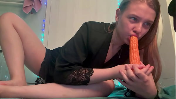 Fucked herself with a huge cornball until she squirted.
