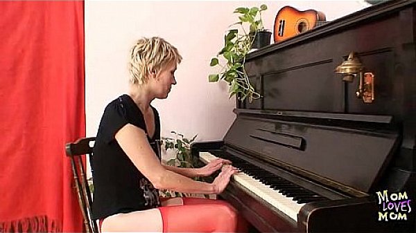 Blonde Milf In Red Stockings Kinky Dildo Action thumbnail