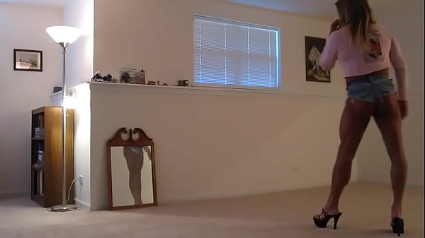 Tanned Blonde Crossdresser In Cheeky Short Shorts thumbnail