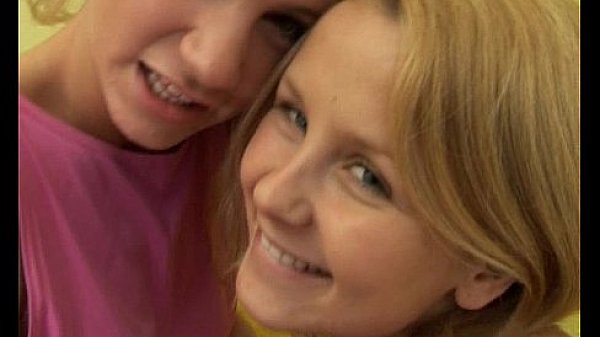 Angelic Blonde Busty Lesbians Sharing Dildo thumbnail