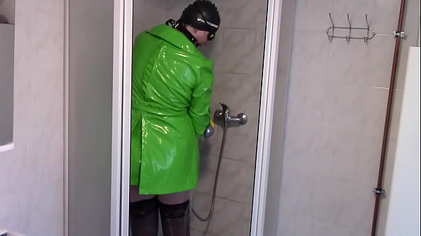 Handcuffed Milf Showered In Wellies And Pvc Raincoat thumbnail