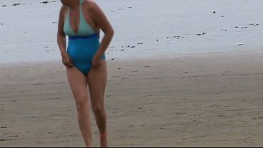 Enjoying The Beach With My Stepmom, Great Handjobs And Cumshots In Her Hairy Pussy thumbnail