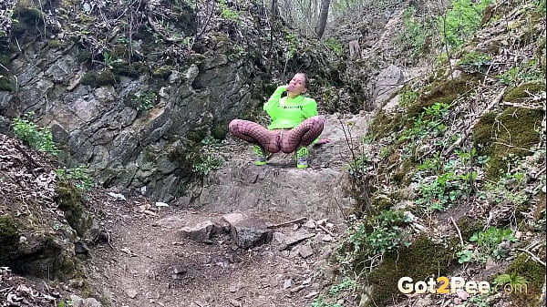 Got2pee Brings Another Desperately Peeing Girl In Flaunting Fishnets - Featuring Big Puddle thumbnail