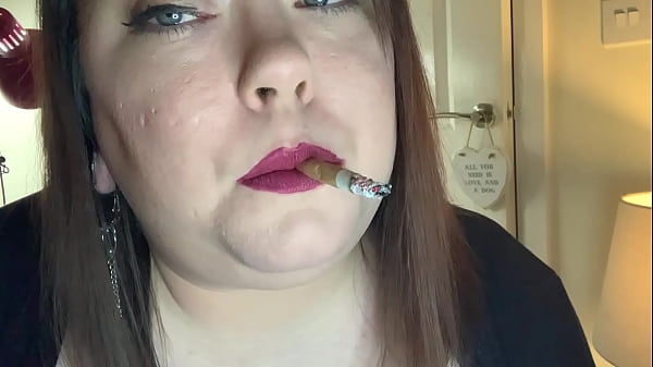 Chubby Mistress Smoking A Cig With Lots Of Omi's thumbnail