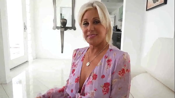 Appetizing milf masturbates on the coach