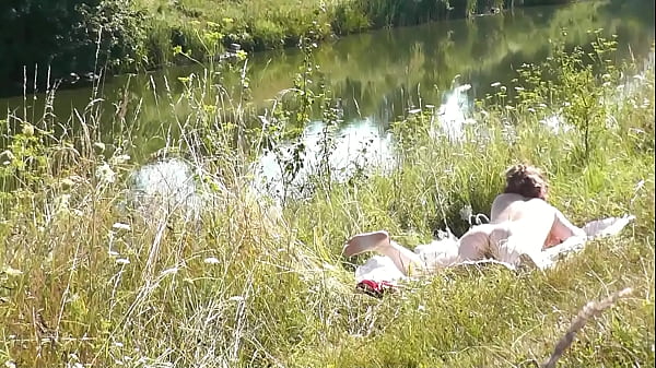 Nude Milf Sunbathing On River Bank. Random Guy Watching. Nudist Beach. Pov. Naked In Public. Doggy Style thumbnail