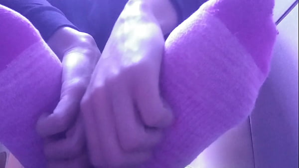 COLORED SOCKS AND SOLES AFTER A BUSY DAY 