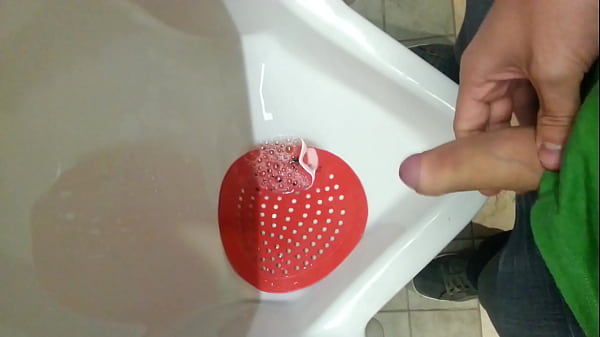 guy with uncut cock pees in public then plays with cock 