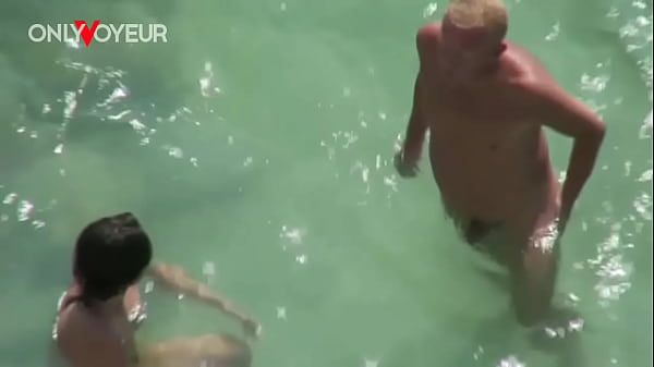 Beach Voyeur. Raw Fucking His Wife Doggy On The Public Beach thumbnail