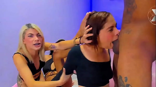 Blonde And Brunette Sluts Show Their Best Talent By Sucking This Big Black Cock thumbnail