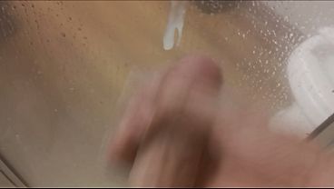 Boy ejaculates a tiny load of cum in shower 